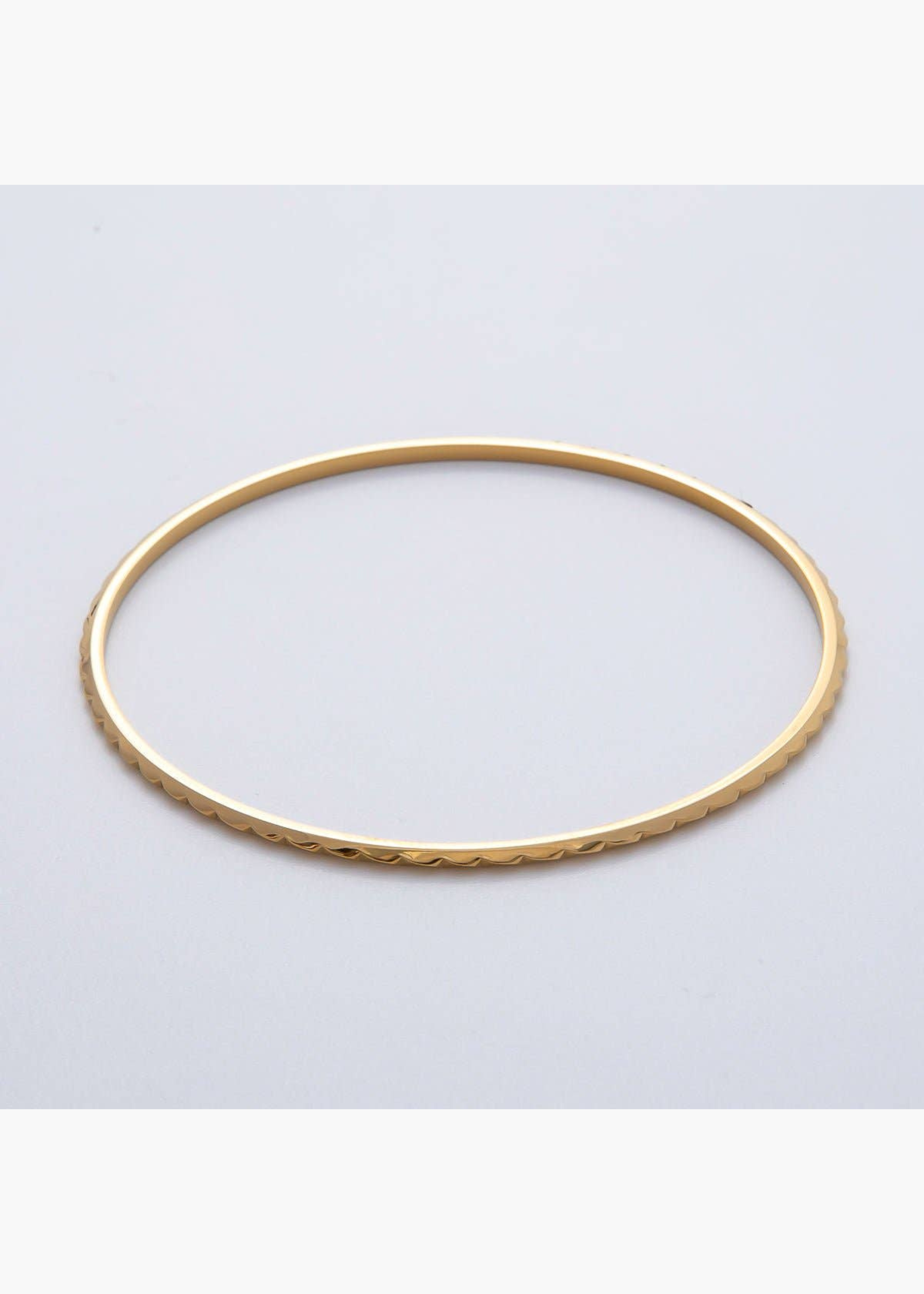 Thin edged geometric bangle