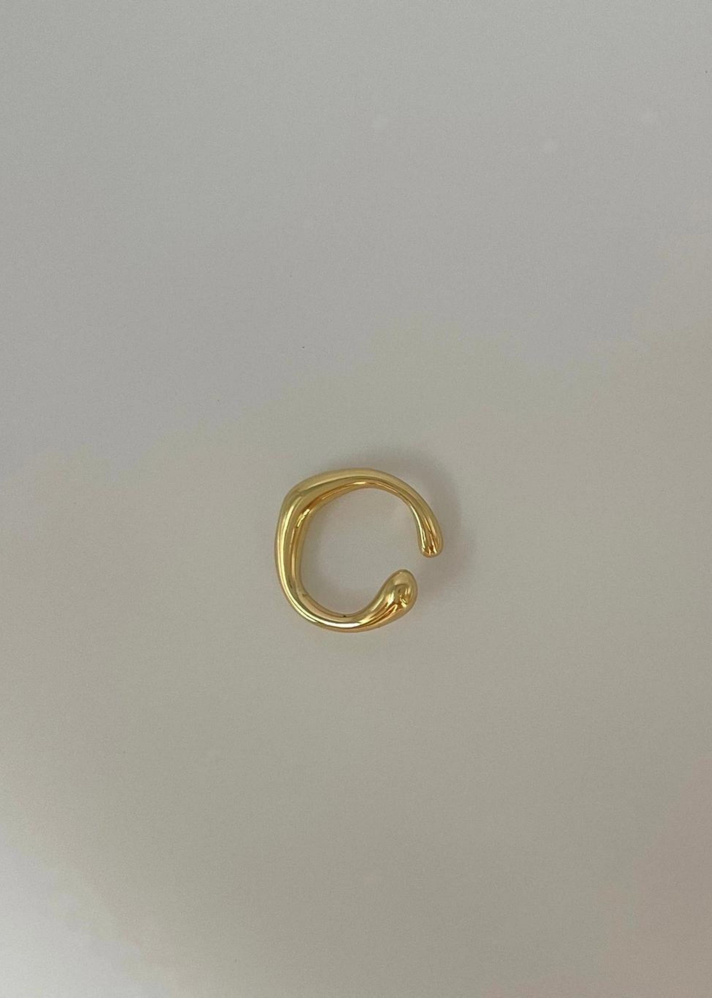 Liquid gold cuff earring