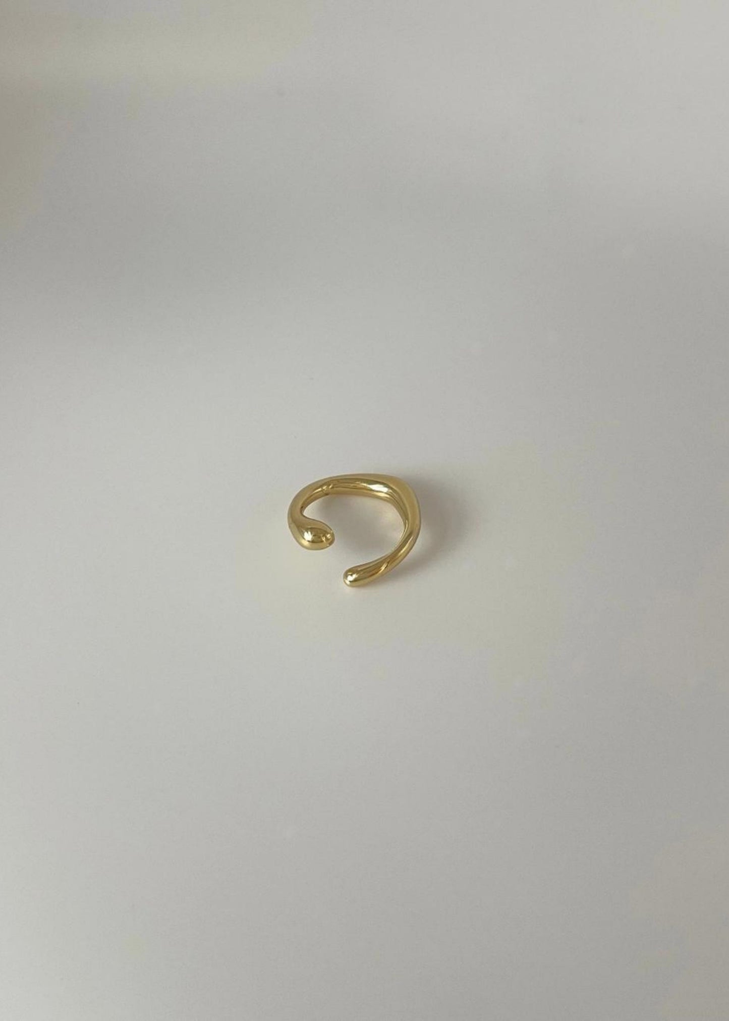 Liquid gold cuff earring