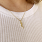 Horn pendant, gold