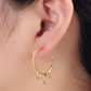 Molten drip hoop earrings