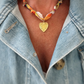 Rome knotted scarf heart charm necklace