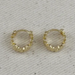 Flower huggie earrings