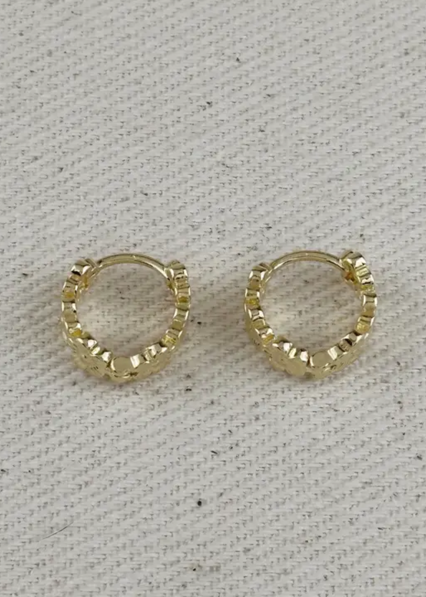 Flower huggie earrings
