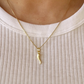 Horn pendant, gold