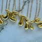 Bubble wavy letter necklace