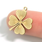 Sunburst four leaf clover charm
