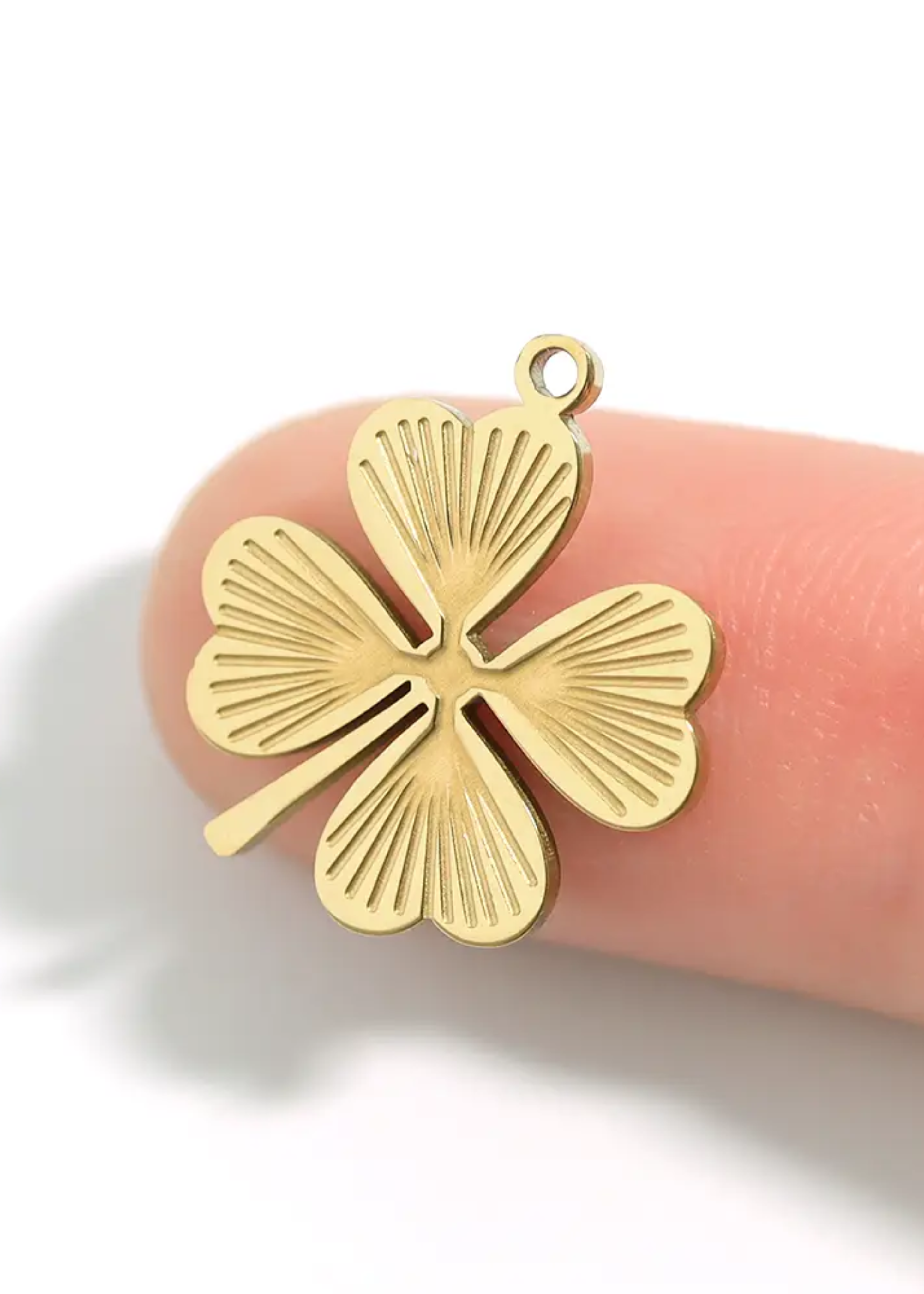 Sunburst four leaf clover charm