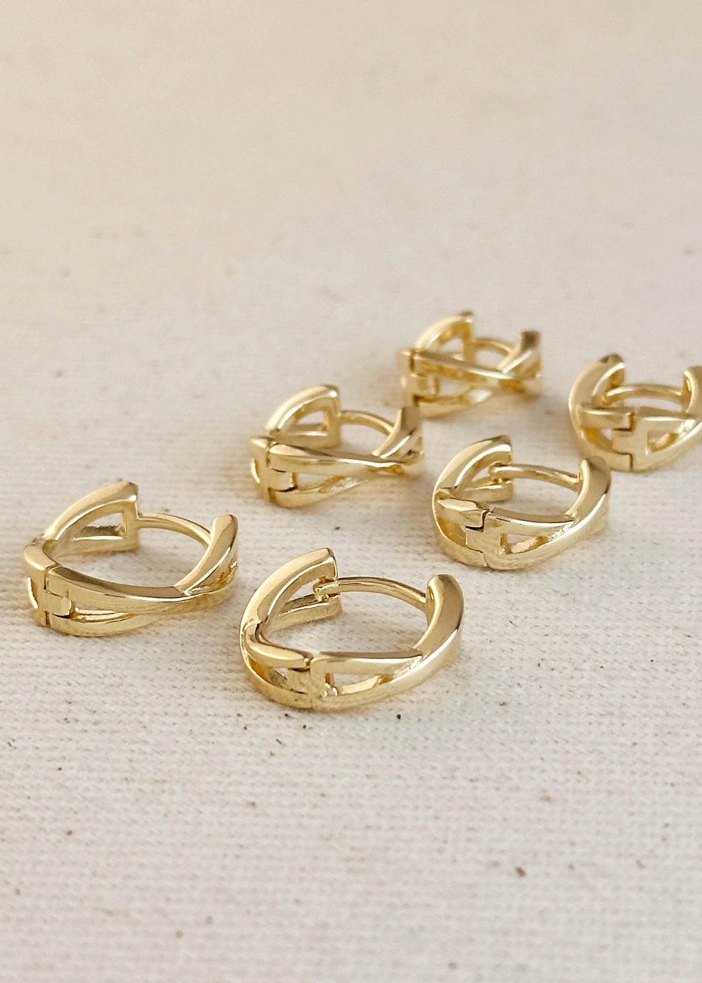 X clicker hoop earrings