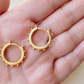 Hoop earrings with ball detail