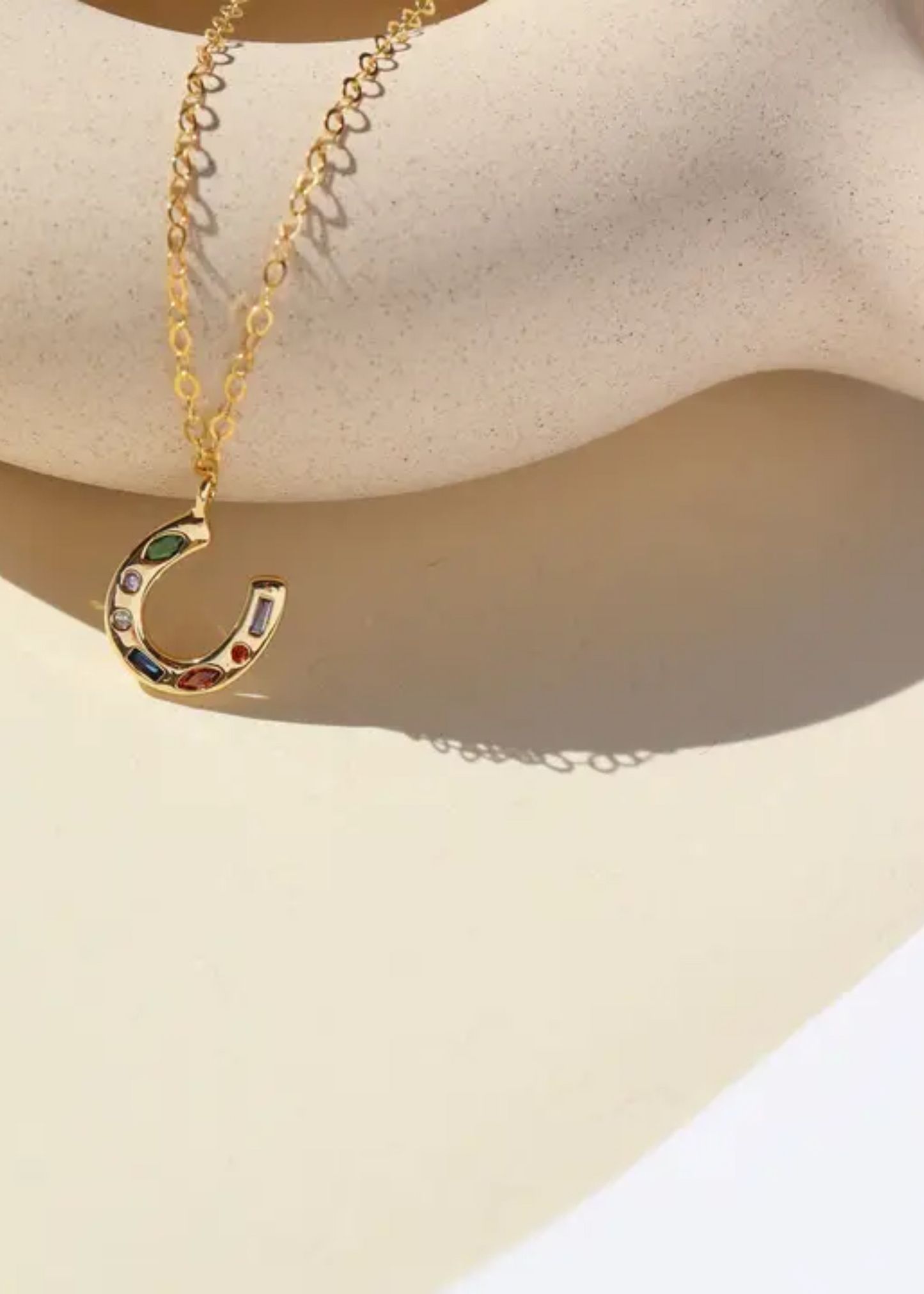 Horseshoe charm necklace