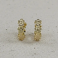 Flower huggie earrings