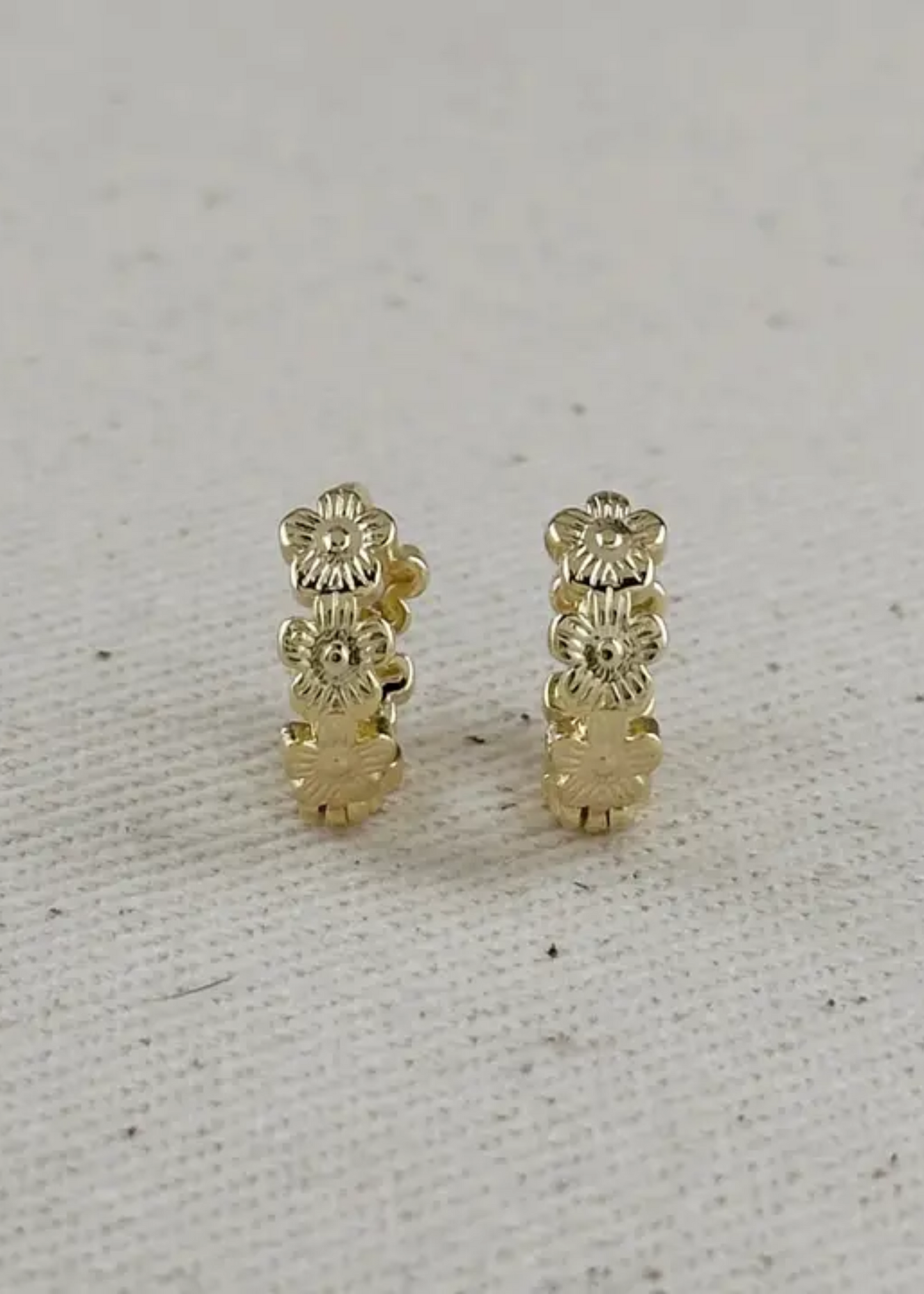Flower huggie earrings