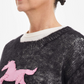 Black sweater, pink pony patch