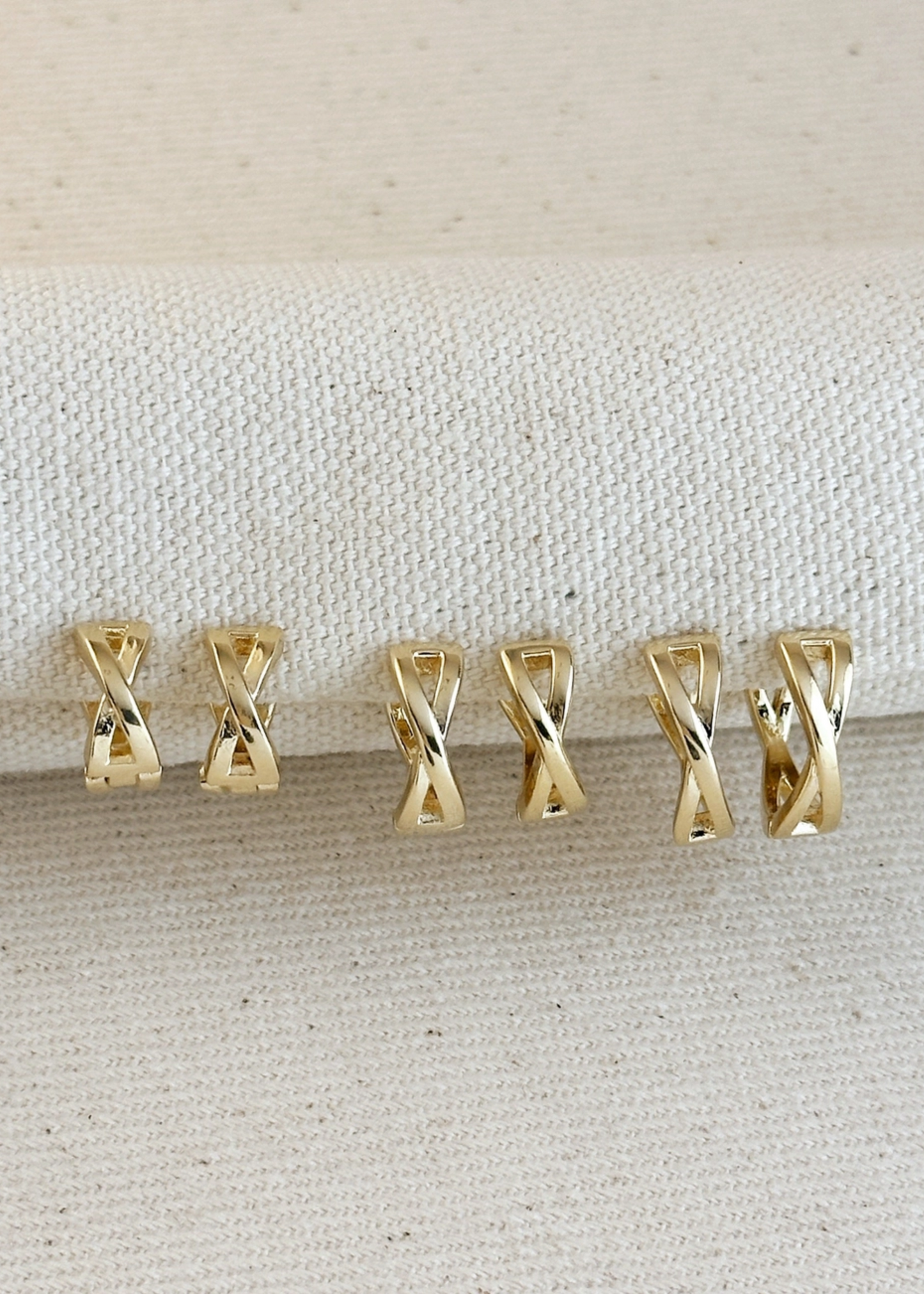 X clicker hoop earrings