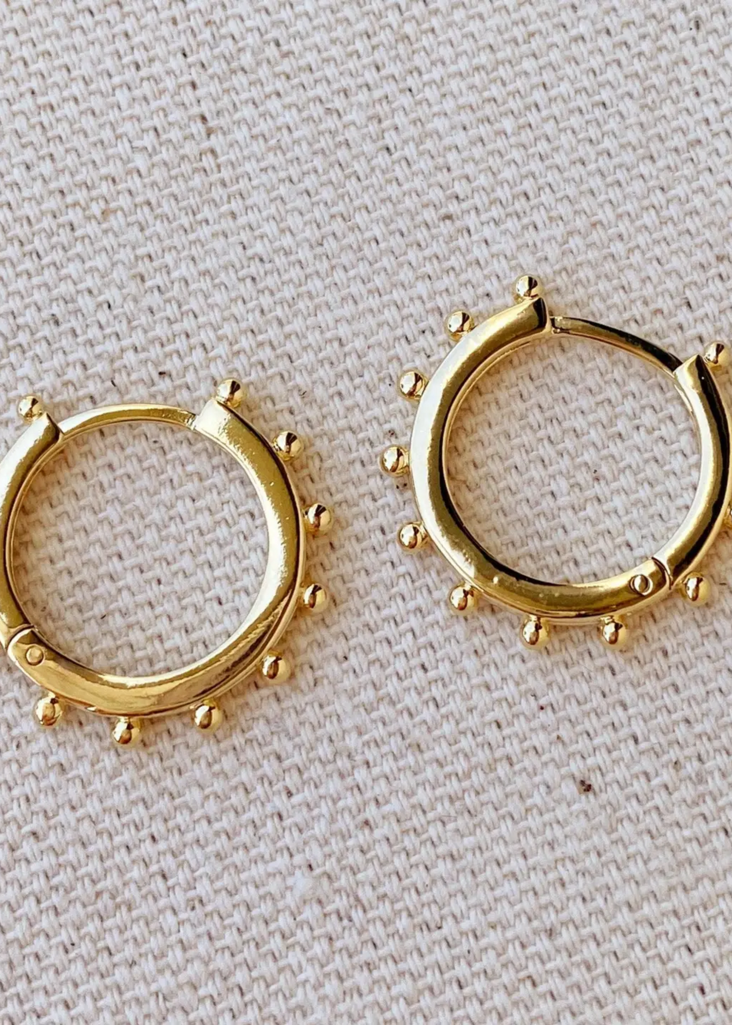 Hoop earrings with ball detail