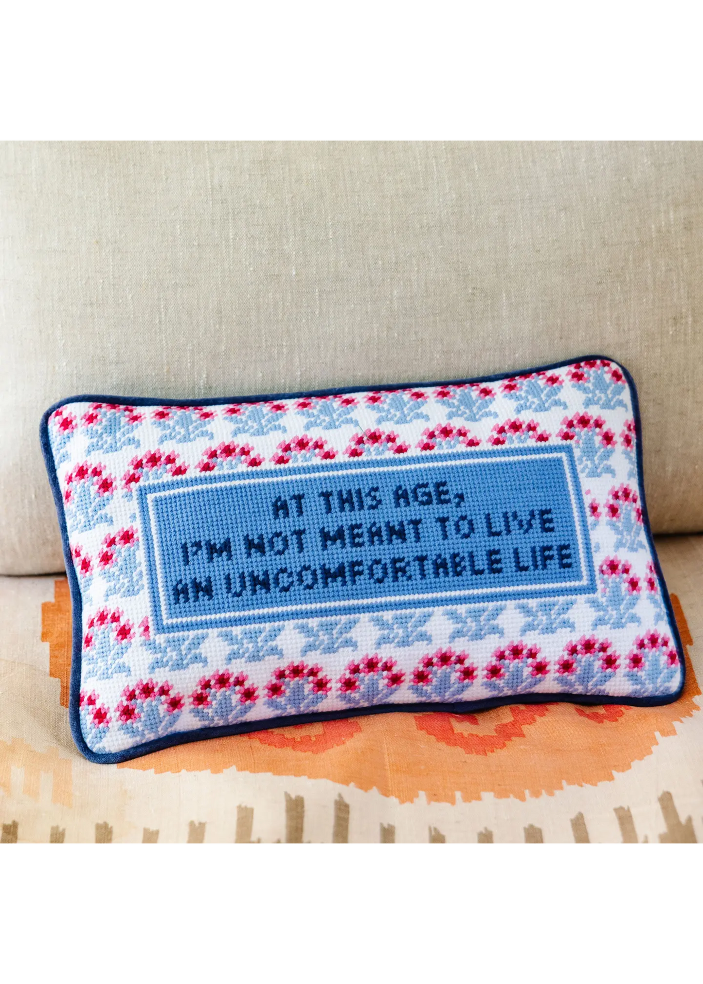 Uncomfortable needlepoint pillow