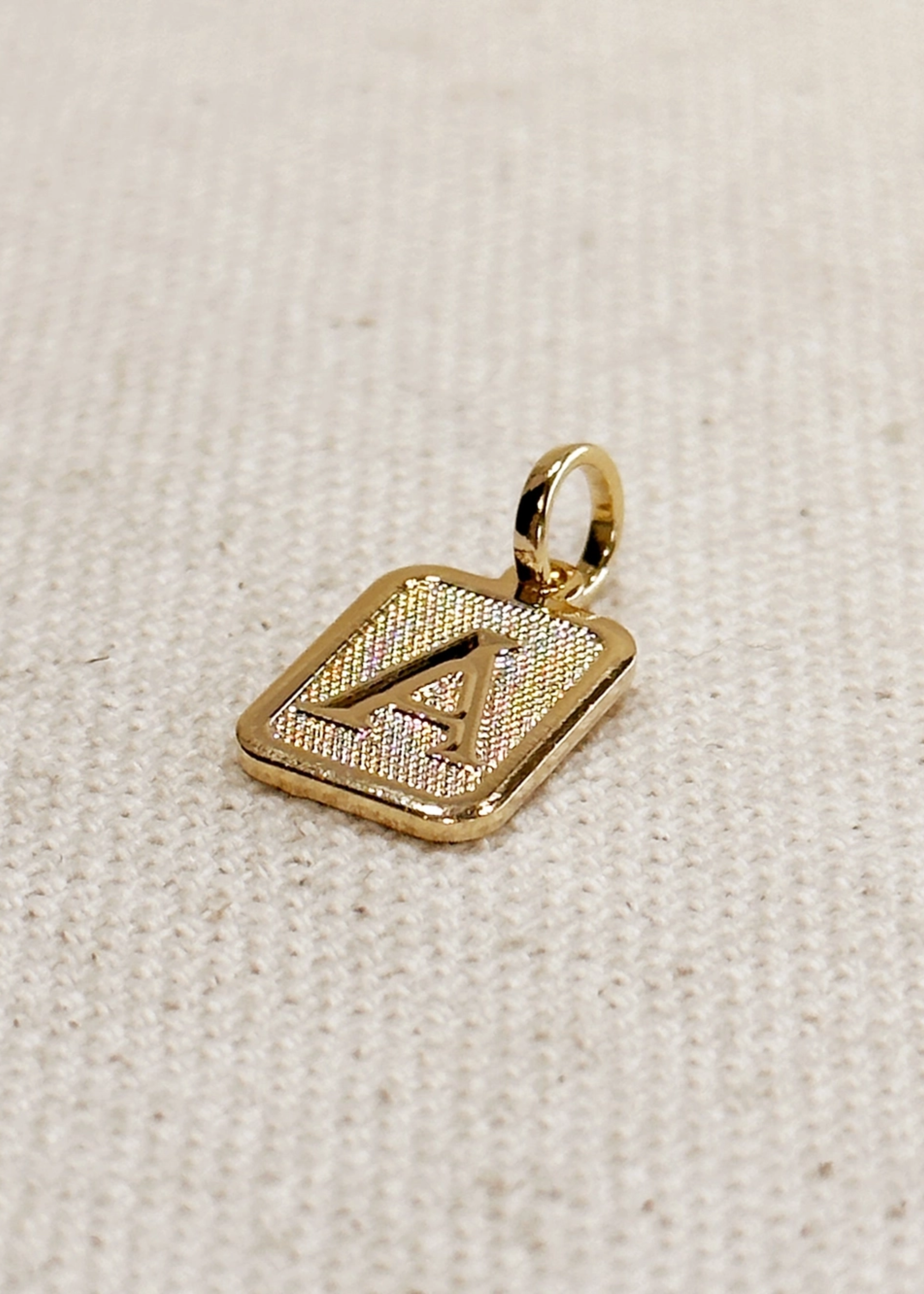 Textured initial plate pendant