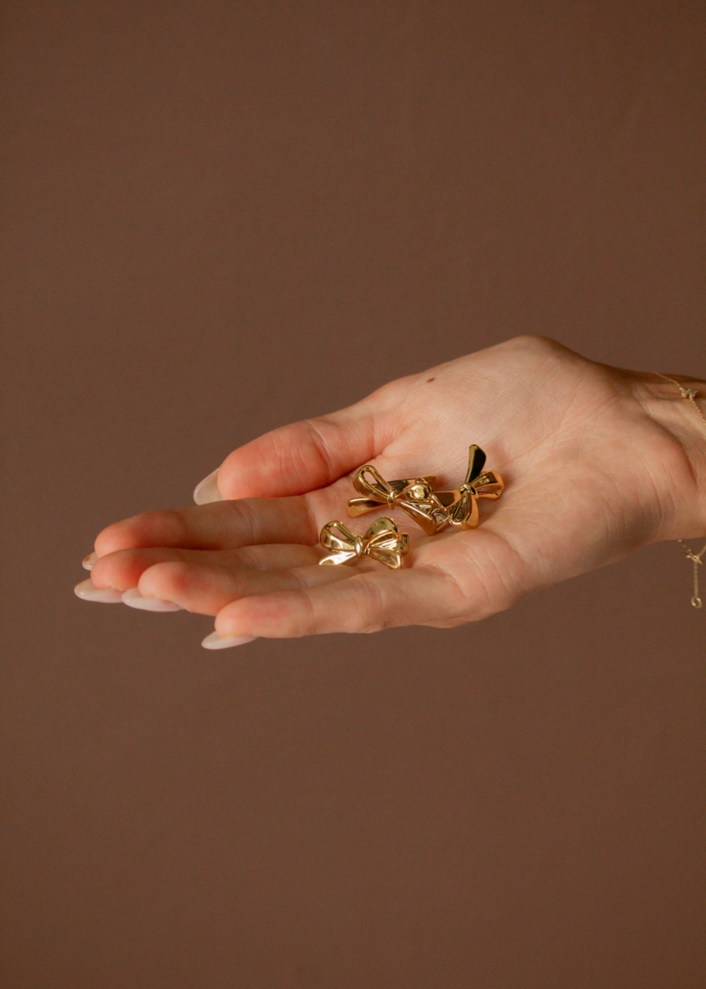 Mini bow clips, gold