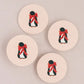 Fancy penguin bow coasters, set of four