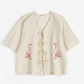 Embroidery tied blouse