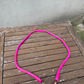 Metallic pink hand-braided leather strap