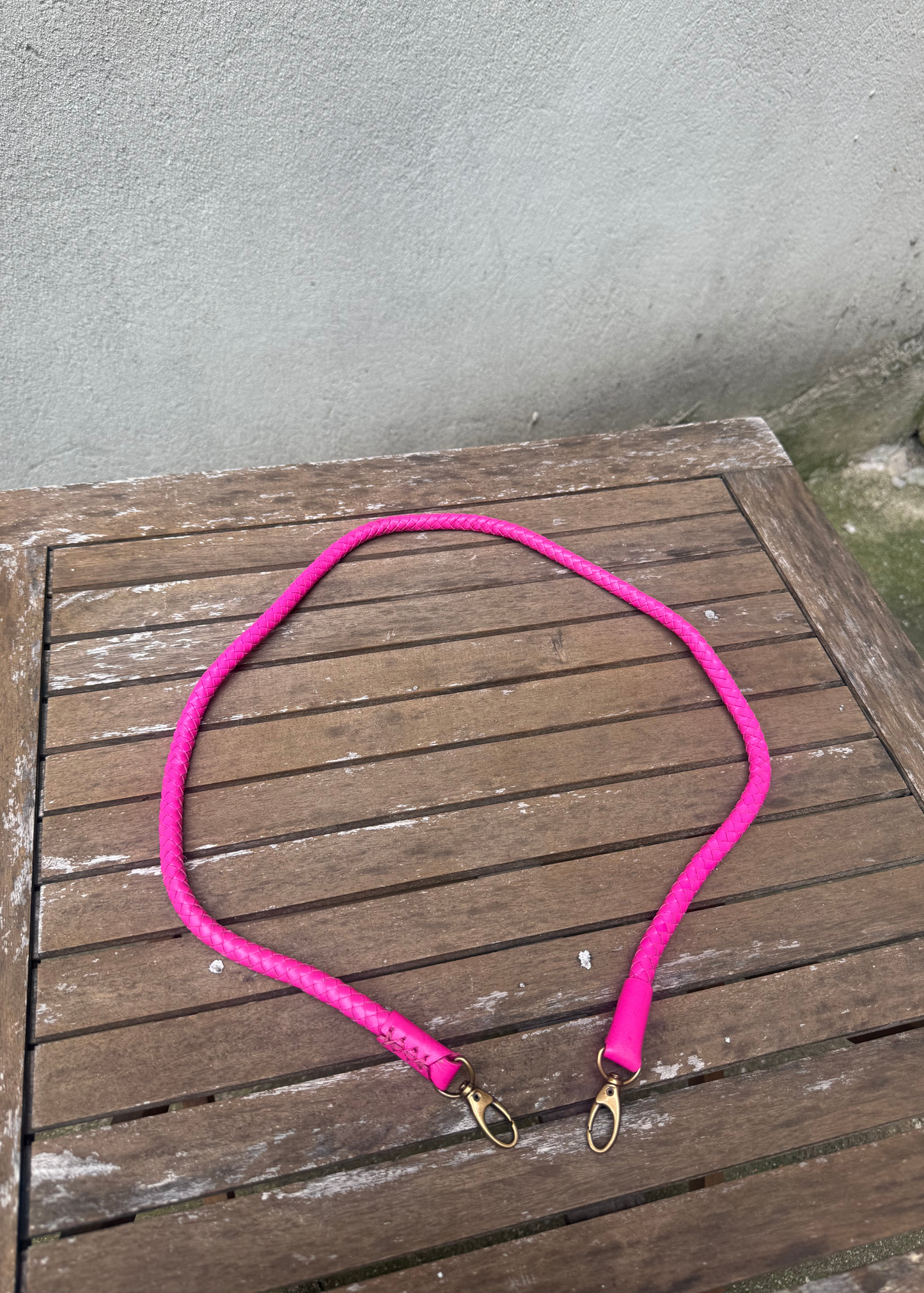 Metallic pink hand-braided leather strap