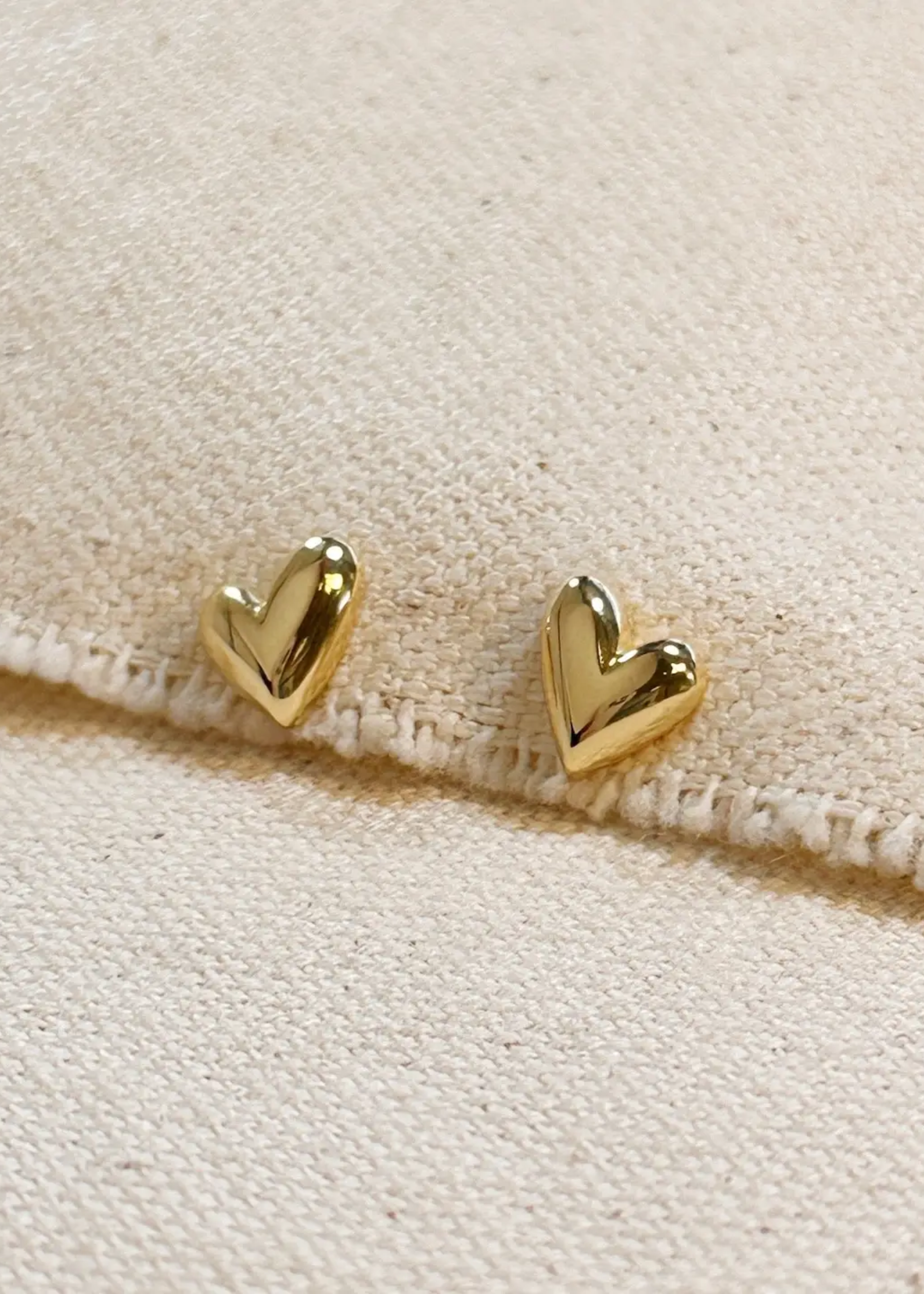 Uneven heart earrings