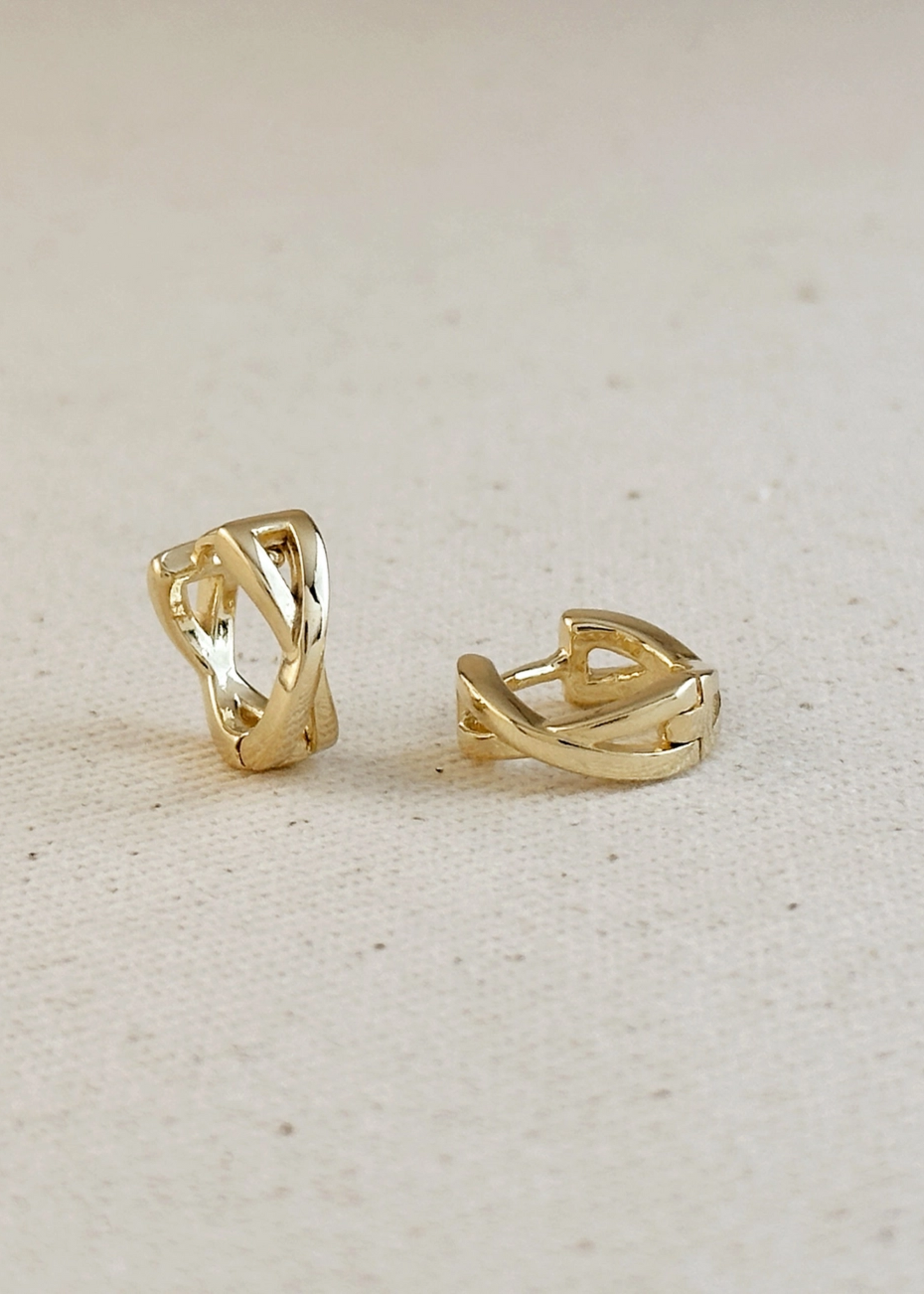 X clicker hoop earrings