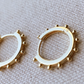 Hoop earrings with ball detail