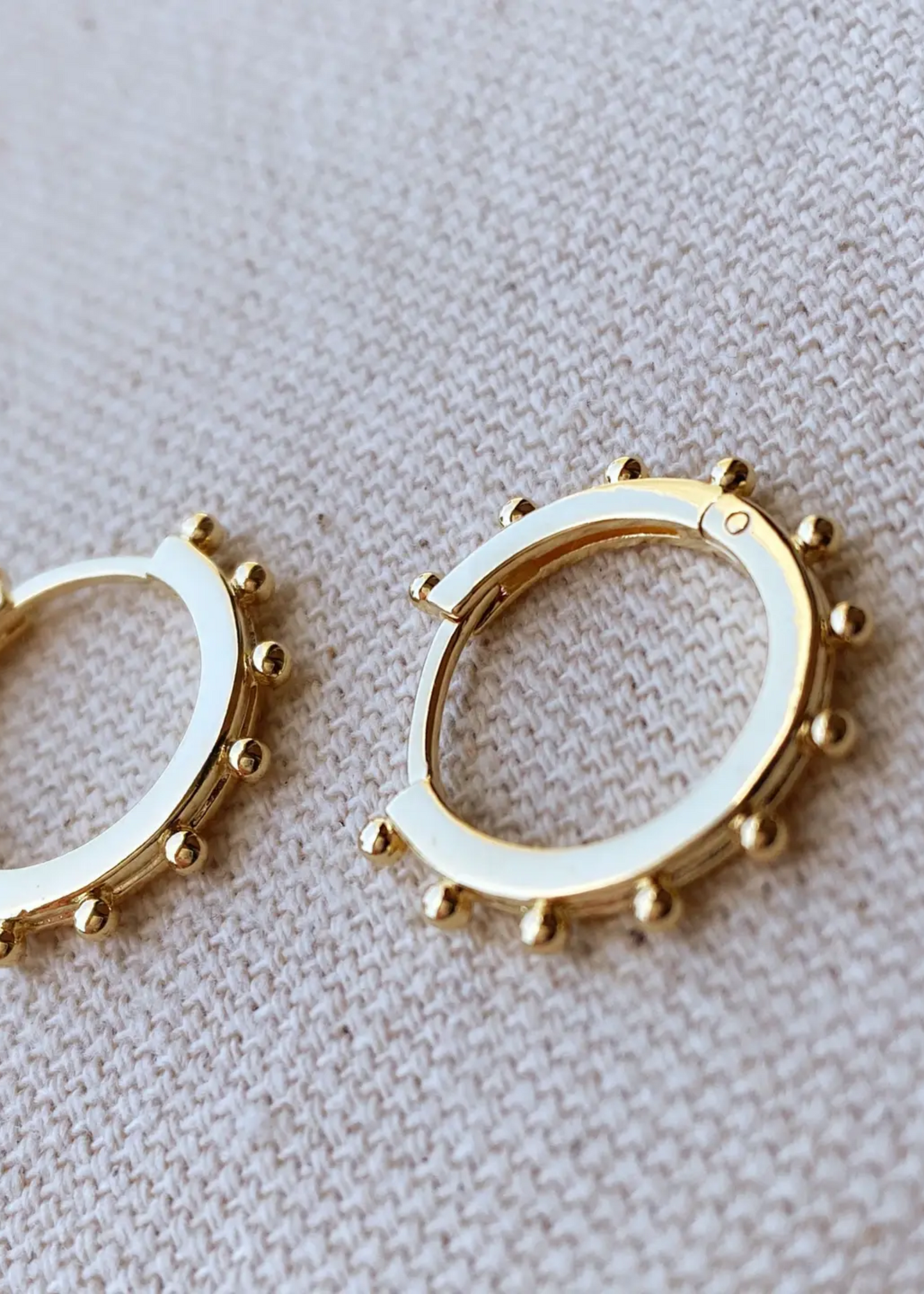 Hoop earrings with ball detail