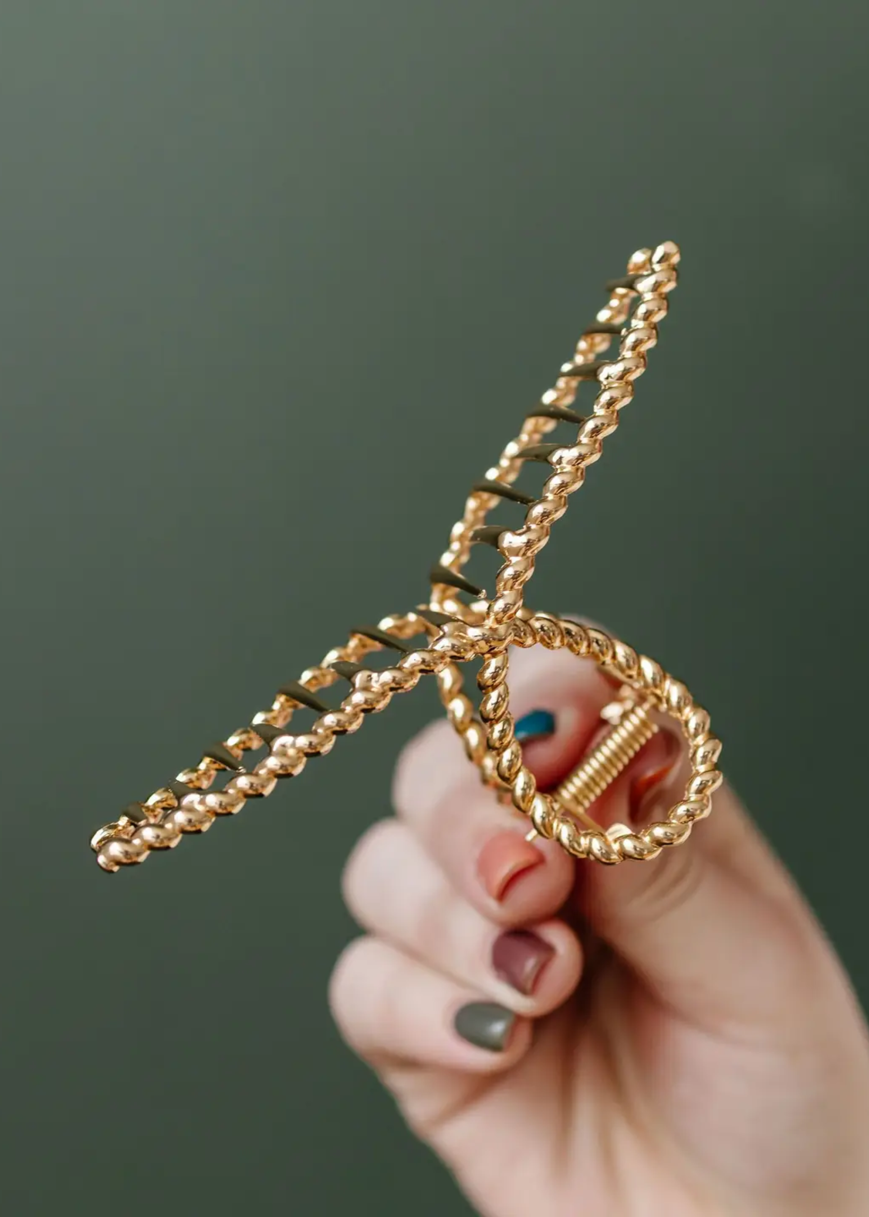 Twisted gold claw clip