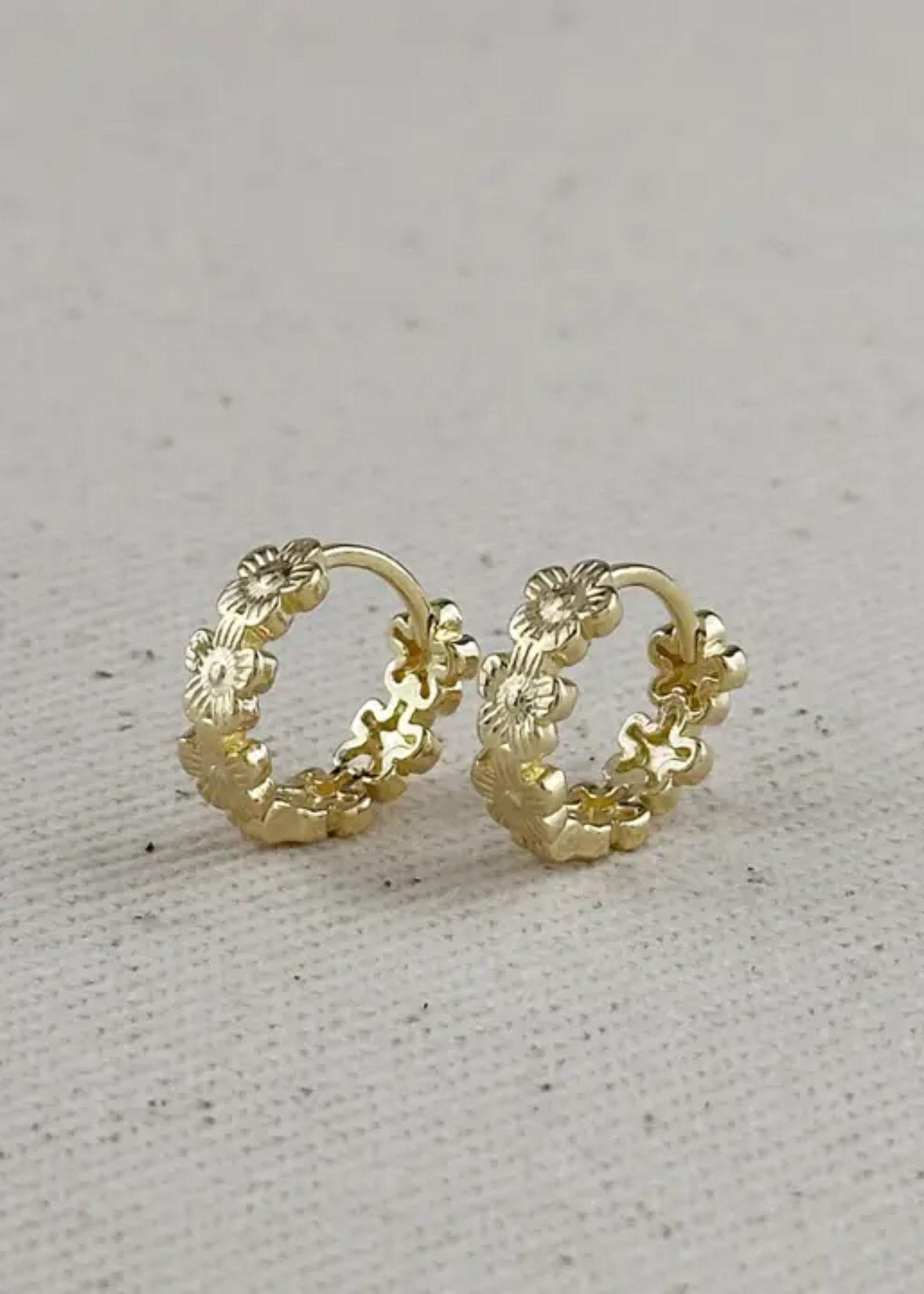 Flower huggie earrings