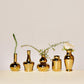 Mini pear vase, metallic gold