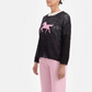 Black sweater, pink pony patch