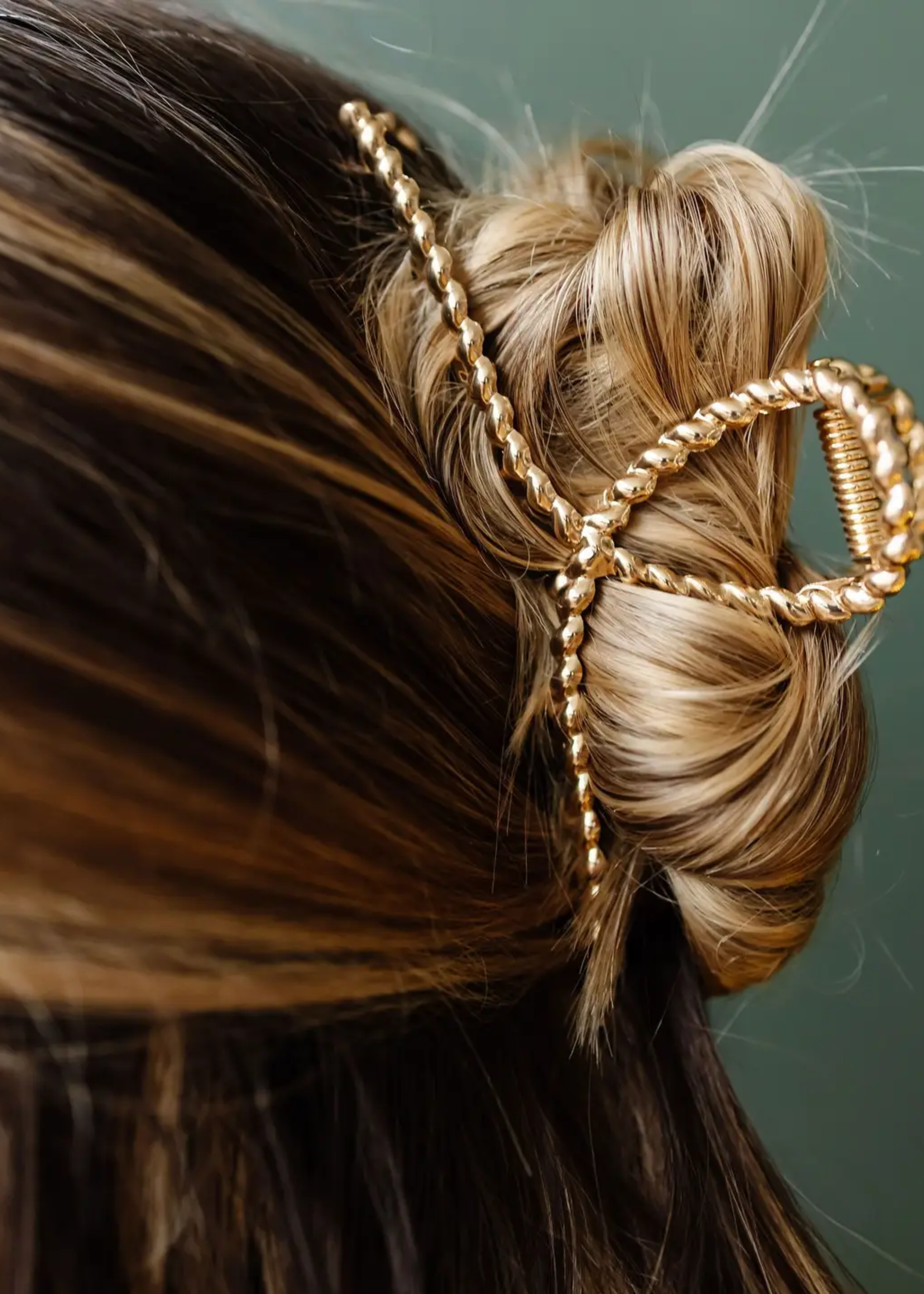 Twisted gold claw clip