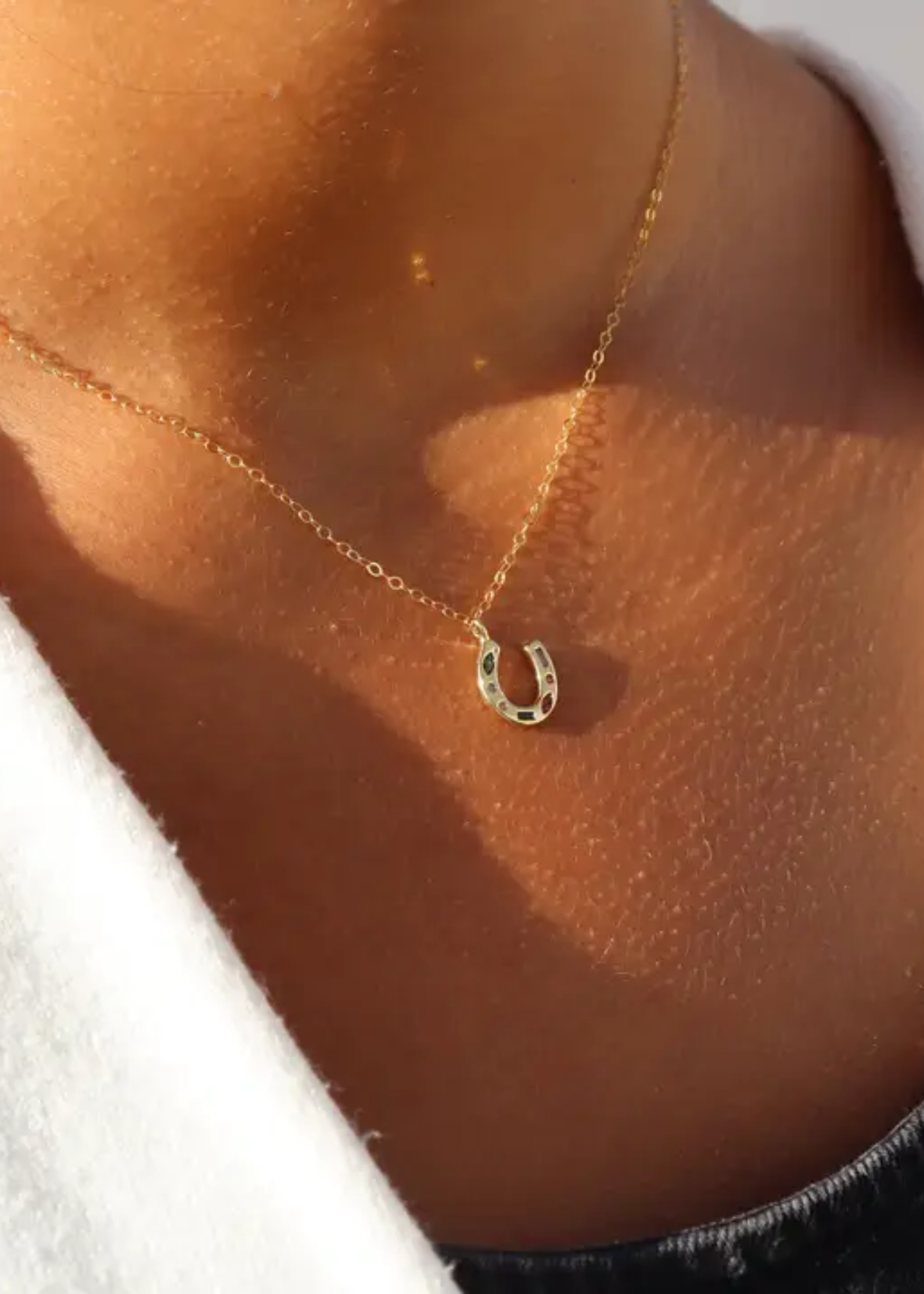 Horseshoe charm necklace