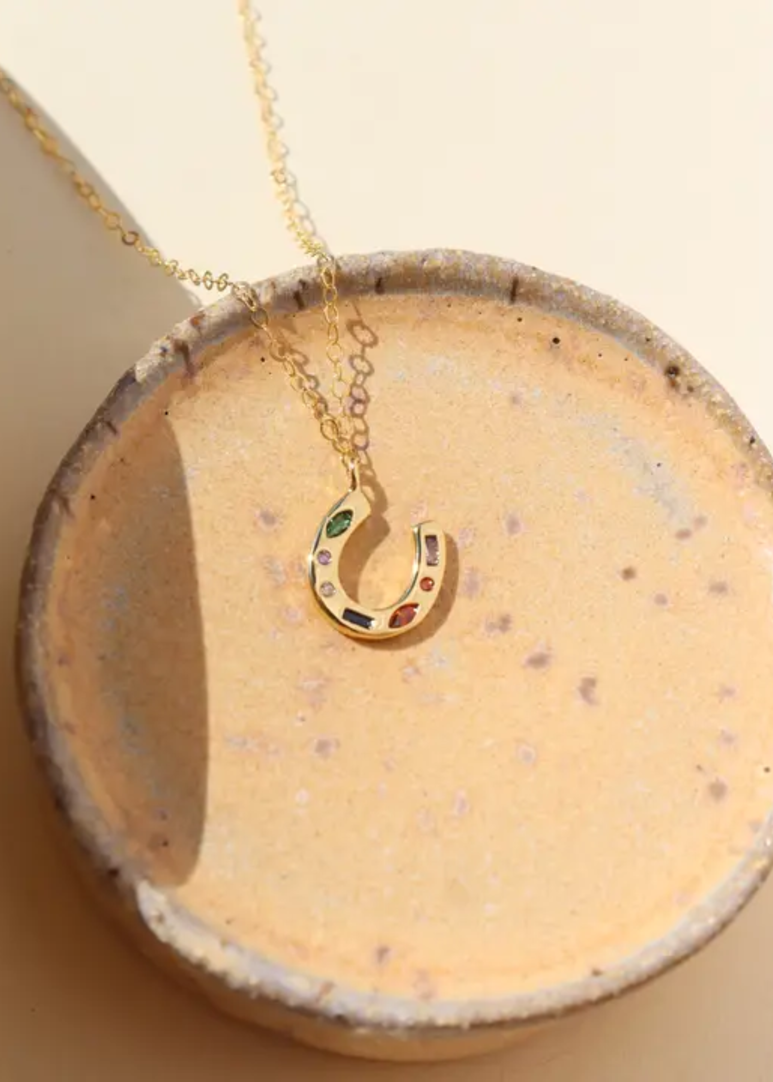 Horseshoe charm necklace