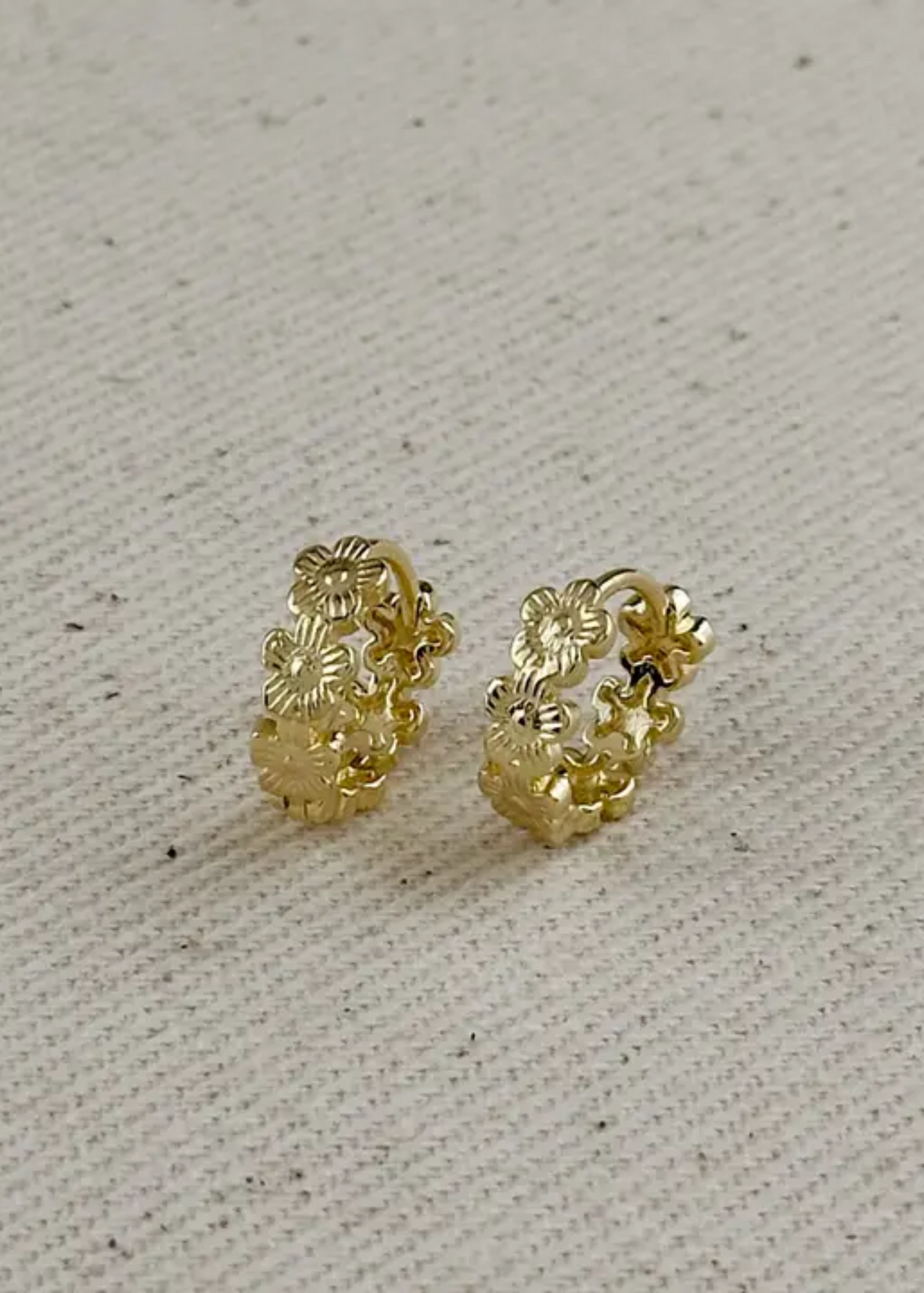 Flower huggie earrings
