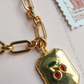 Cherry stained kisses necklace