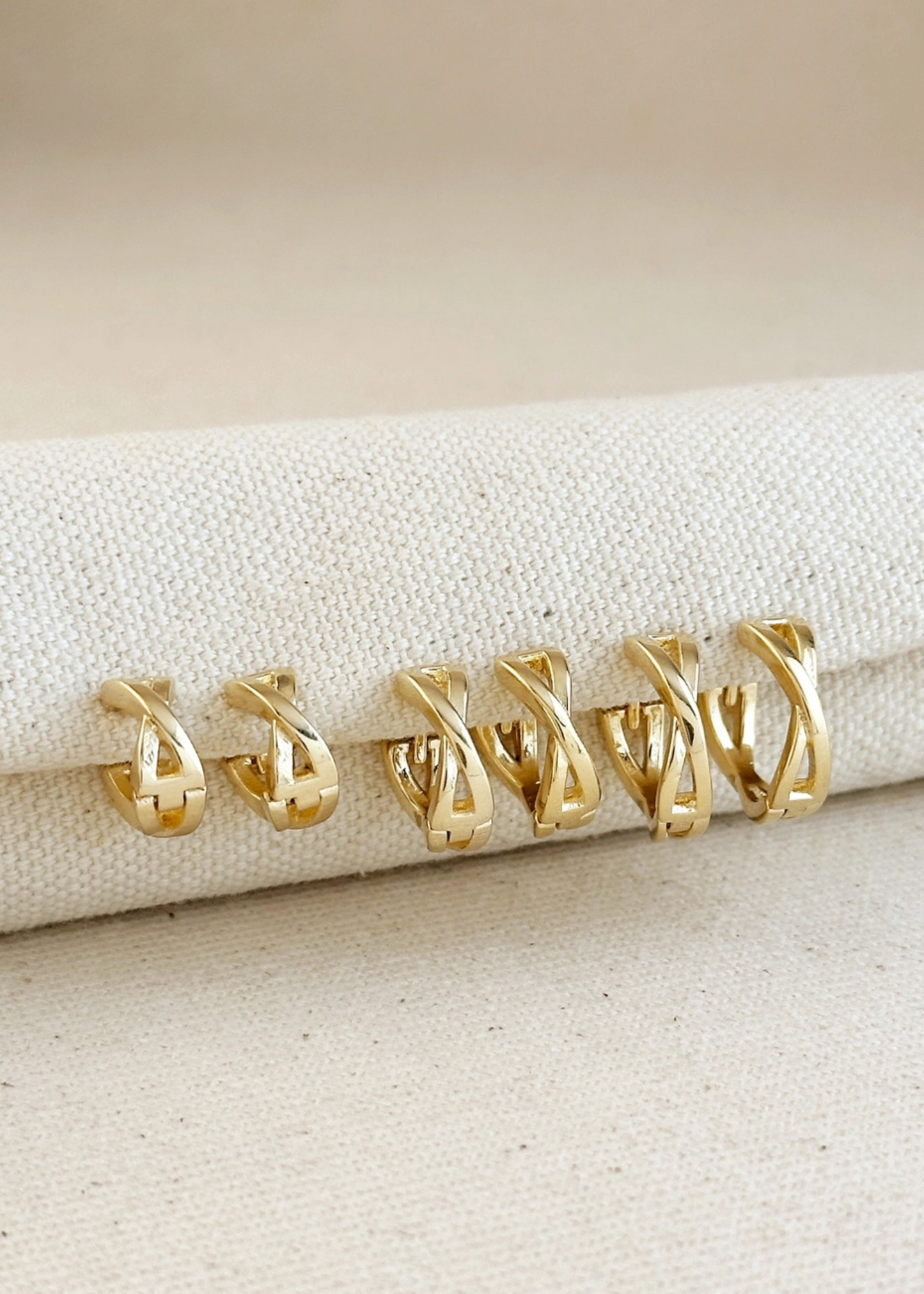 X clicker hoop earrings