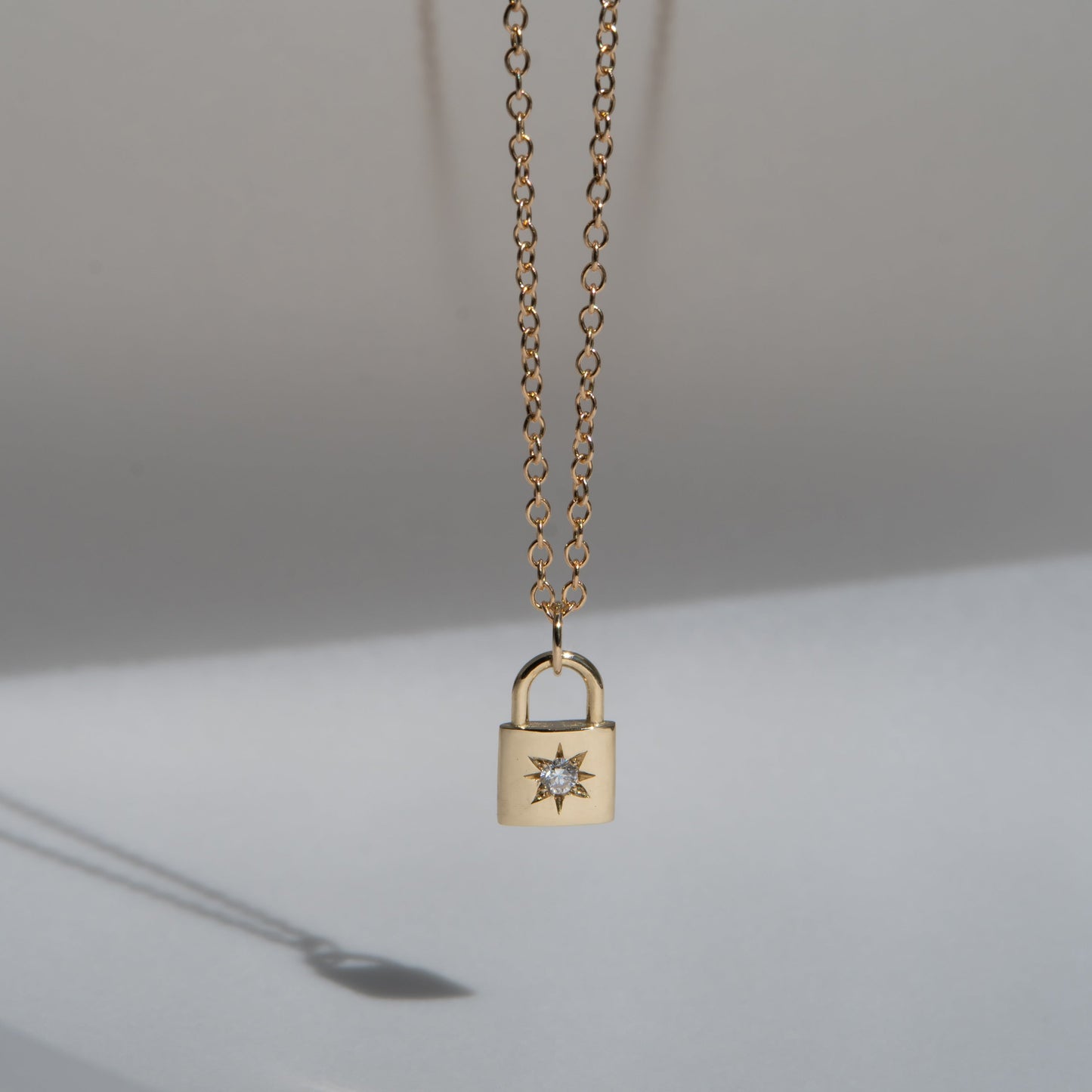 North star padlock necklace, 14k yellow gold