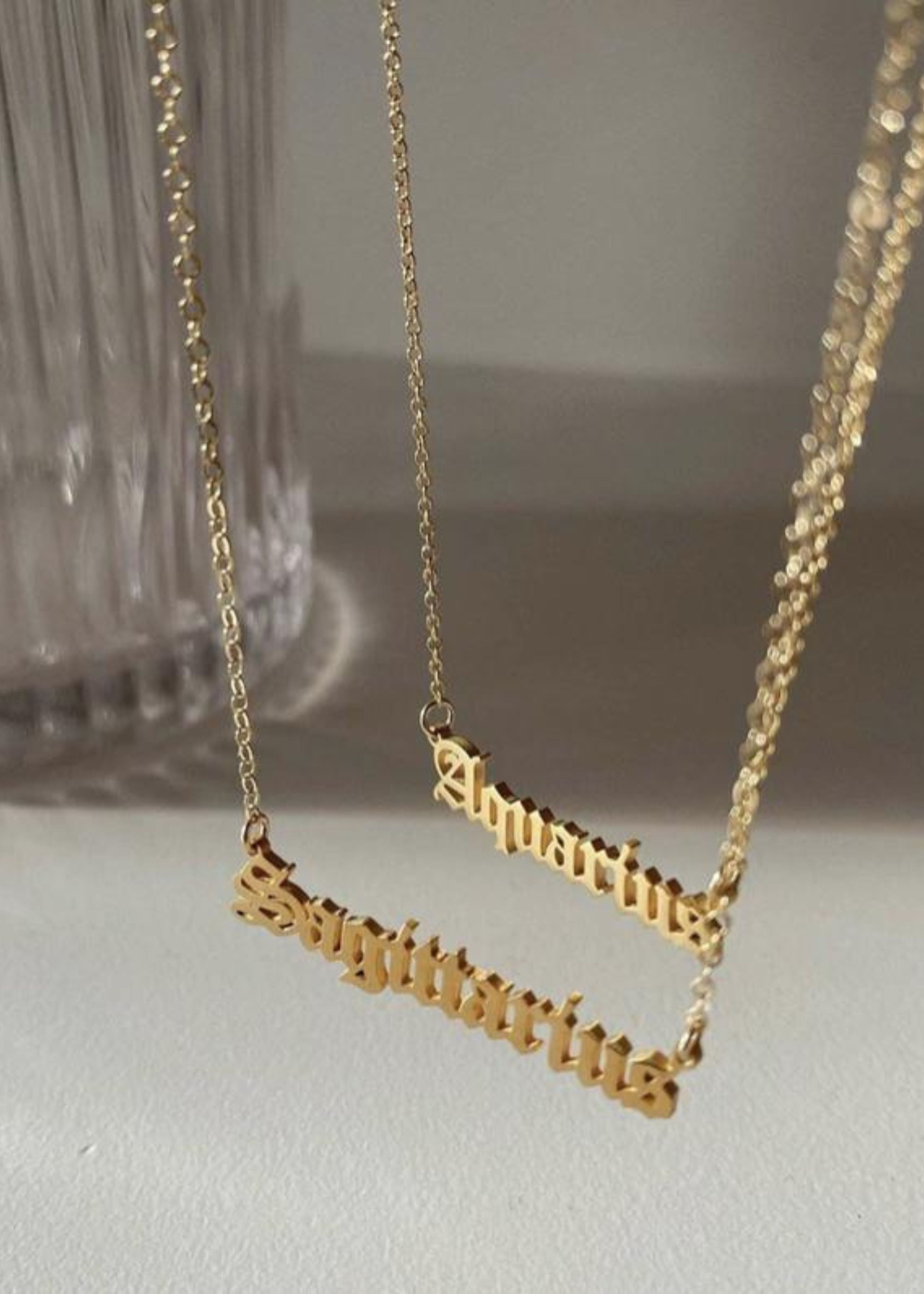 Zodiac nameplate necklace