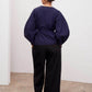 Sculptured wrap top