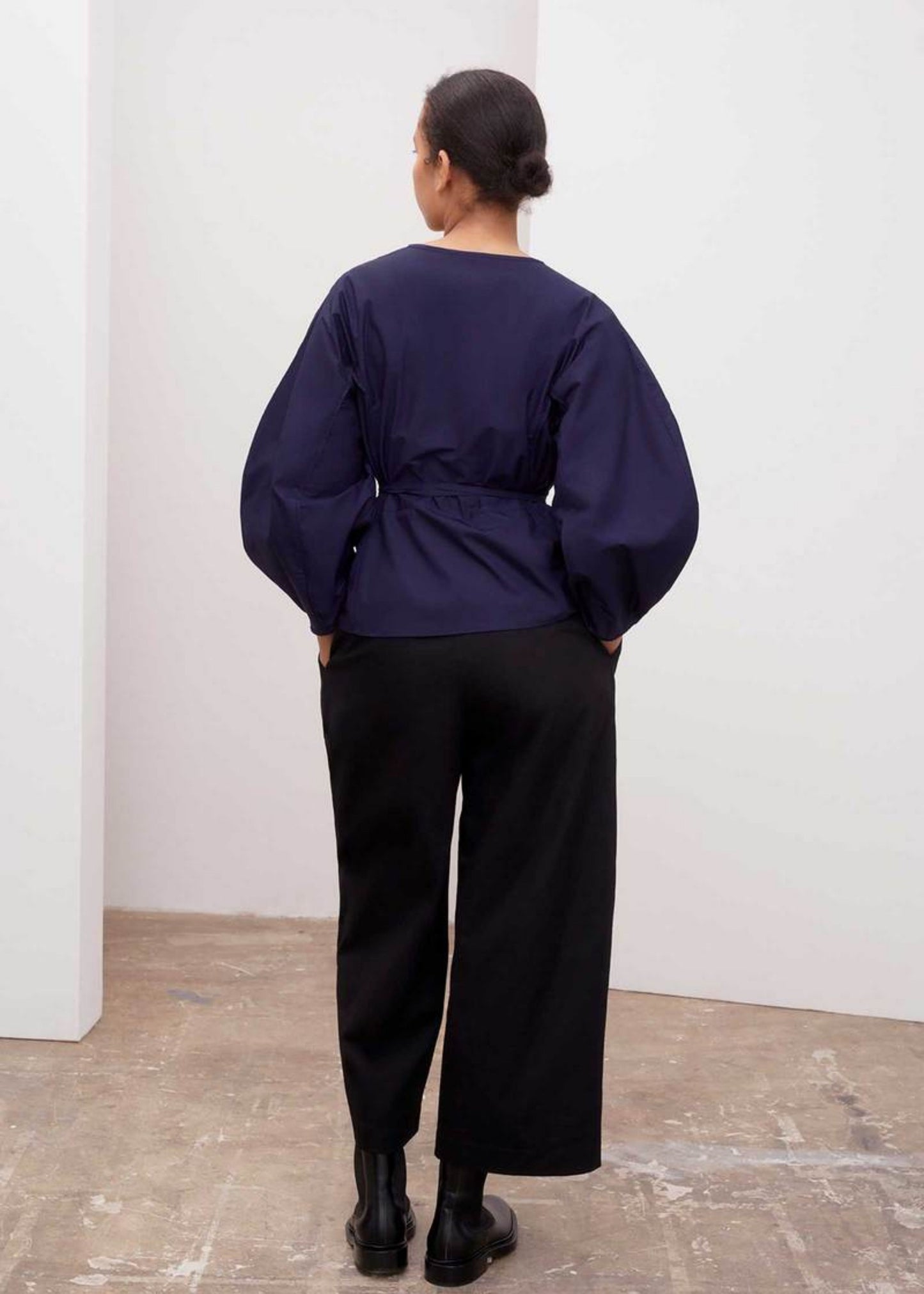 Sculptured wrap top