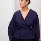 Sculptured wrap top