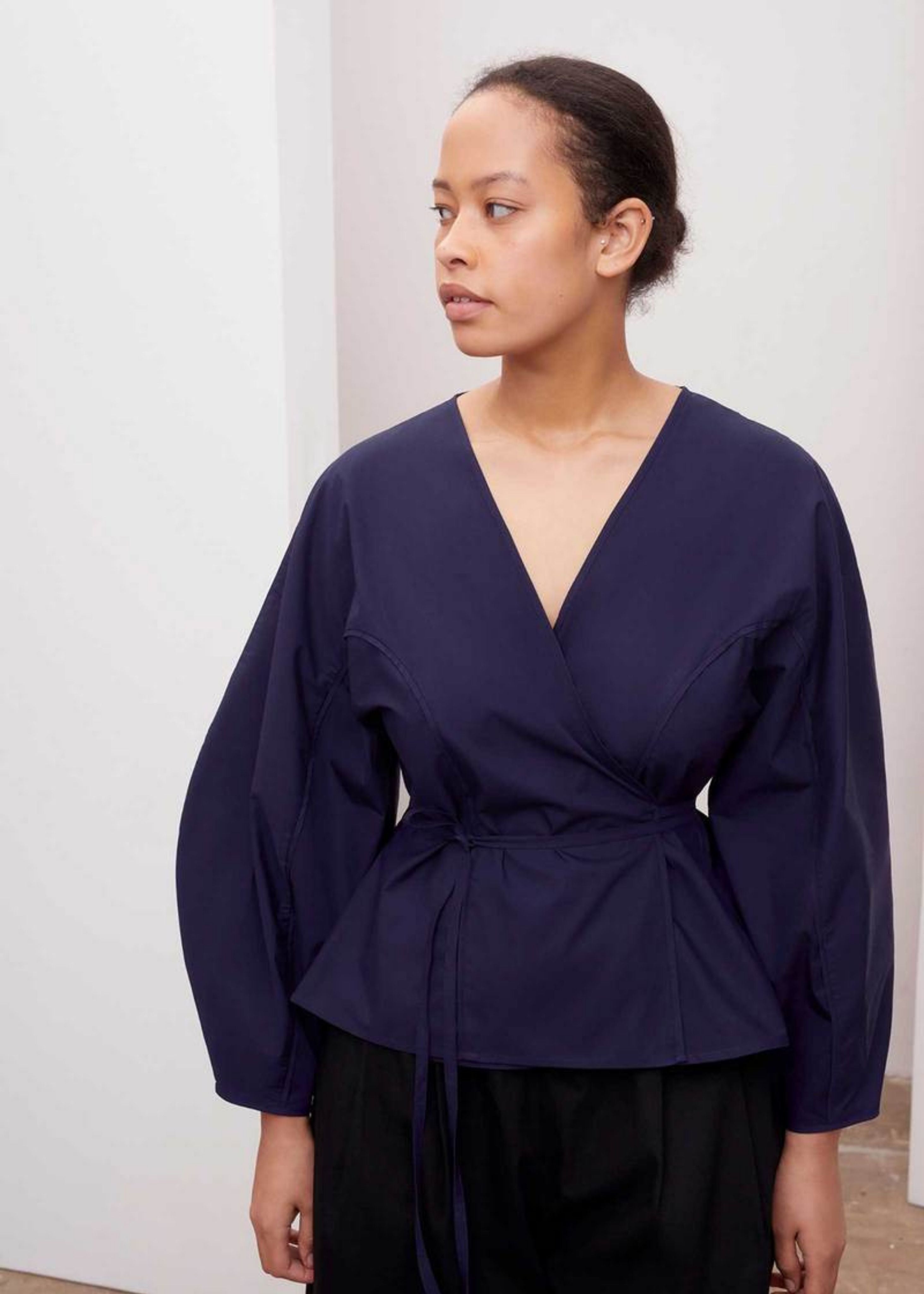 Sculptured wrap top